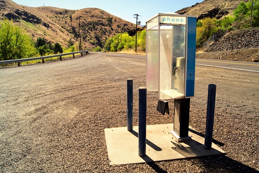 A vintage old phone booth along the Hell's Canyon Scenic Byway (US-82) in rural eastern Oregon