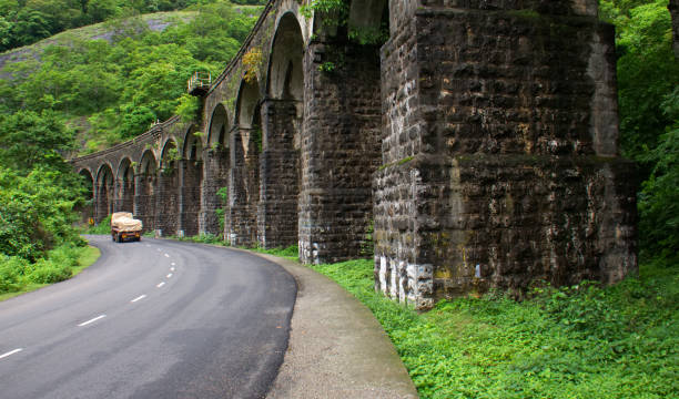 old railway bridge at thenmala aryankavu stock photo