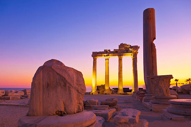 Old ruins in Side, Turkey at sunset stock photo
