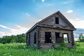 istock Old rural wooden abandoned house in russian village 1298382485