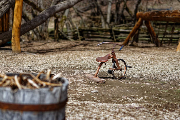 Old rusted child bike stock photo