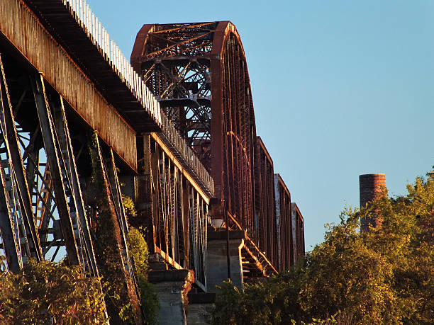 Old rusted metal train bridge stock photo
