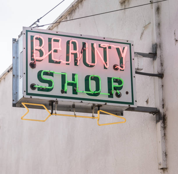 Old Small Town Neaon Beauty Shop Sign Vintage Signage The beauty palor is closed but the neaon sign is on vintage beauty salon stock pictures, royalty-free photos & images