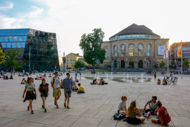Old Synoagoge Square with celebrations in Freiburg stock photo