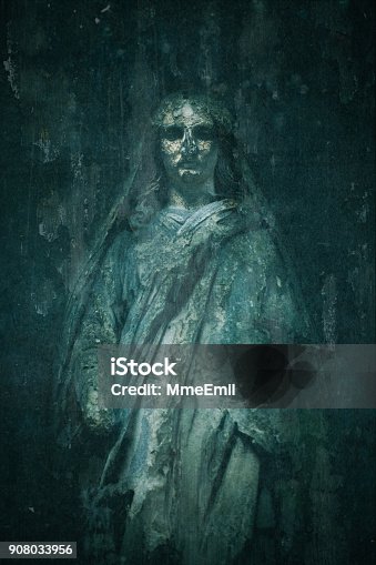 istock Old tombstone of Virgin Mary - Catholicism and Religion - Spooky ghost - Cemetery Pere Lachaise, Paris, France 908033956