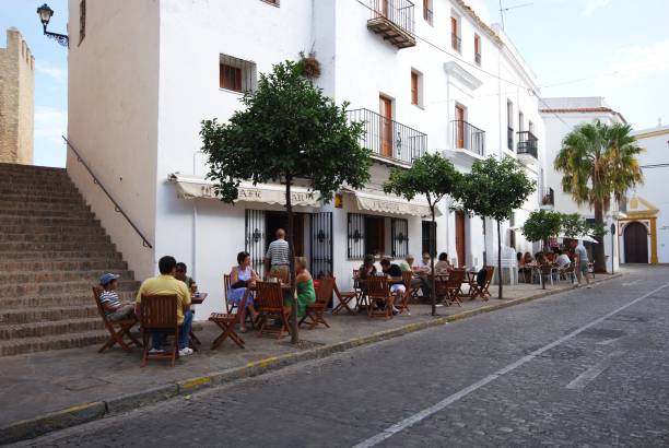 Old town pavement cafes, Vejer de la Frontera, Spain. stock photo