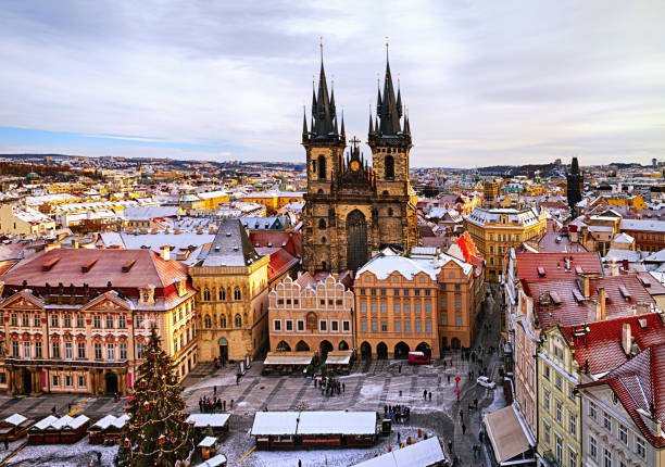 Old Town Square in Prague at christmas time Old Town Square with Church of Our Lady before Tyn at christmas time in Prague, Czech Republic. prague old town square stock pictures, royalty-free photos & images