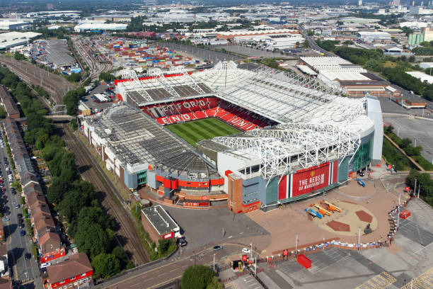 Old Trafford Stadium, Manchester United Football Club Aerial view of Old Trafford Stadium, home of Manchester United Football Club in Manchester, England, UK manchester united stock pictures, royalty-free photos & images