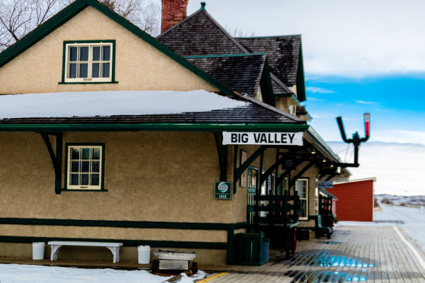 old train station and platform workings. bigg valley, alberta, canada - bigg imagens e fotografias de stock