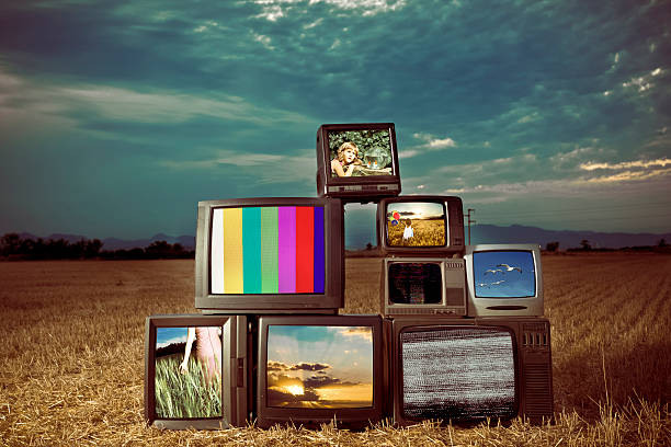 Old TV Show Old Televisions outdoors - All images from my portfolio - Added some grain. medium group of objects stock pictures, royalty-free photos & images