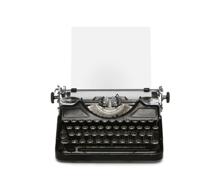 Retro rusty typewriter with paper sheet isolated on white background