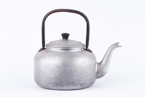 old vintage retro Kettle on white background drink isolated . Which, kettle made of aluminum materials.