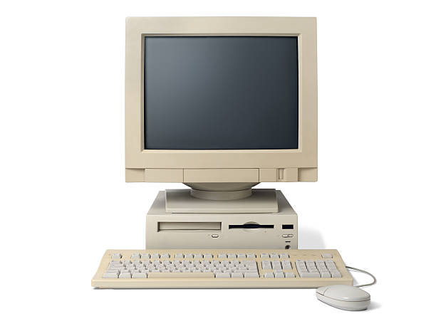 old, white, desktop pc computer with a keyboard and mouse - eski stok fotoğraflar ve resimler