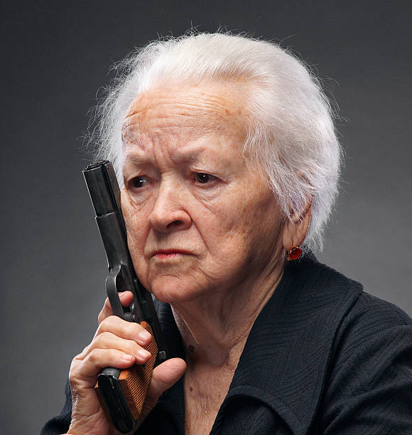 Old Woman Gun Stock Photos, Pictures & Royalty-Free Images ...
