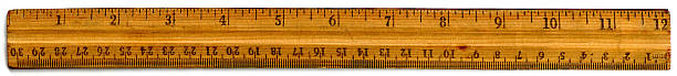 old wooden 12 inch ruler with inch and centimeter markings Old wooden 12 inch ruler with inch and centimeter markings. ruler stock pictures, royalty-free photos & images
