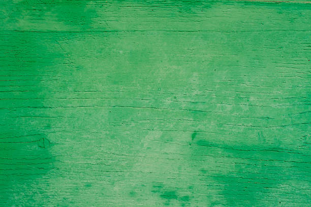 Old wooden surface painted green stock photo