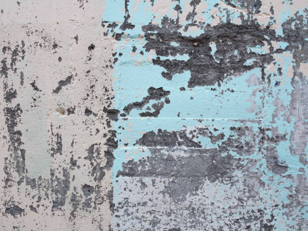 Old worn blue concrete texture on exterior wall. stock photo
