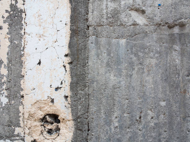 Old worn concrete texture on exterior wall. stock photo