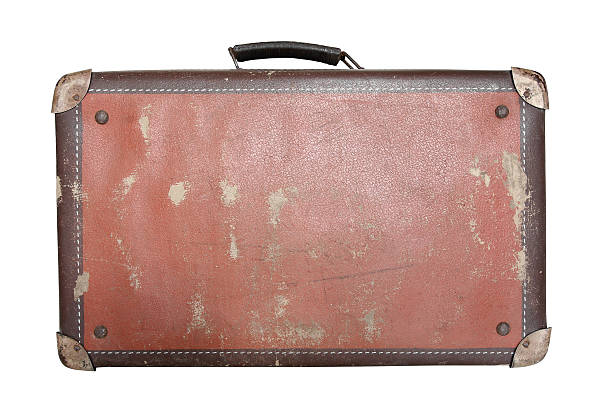 Old worn traveling suitcase stock photo