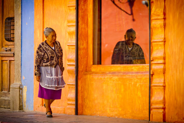 Older Mayan woman in streets of Antigua, Guatemala. stock photo