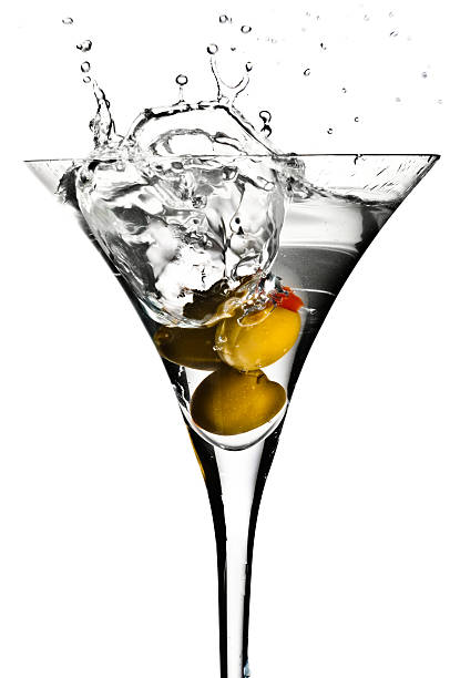 Olive Martini Splash!  dirty martini stock pictures, royalty-free photos & images
