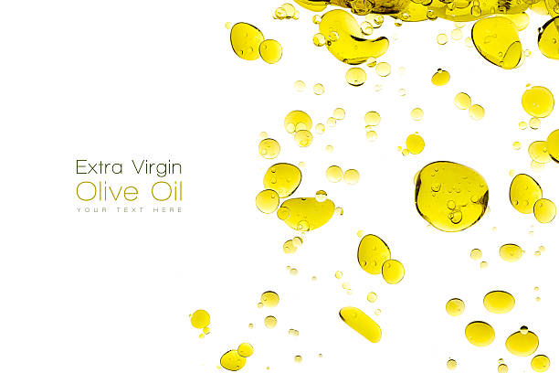 Olive Oil Drops Isolated on White Olive oil drops. Closeup bubbles in water isolated on white. Template design with sample text olive fruit photos stock pictures, royalty-free photos & images