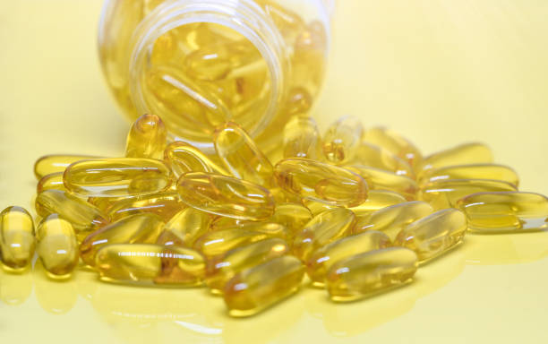 Omega 3 oils capsules stock photo