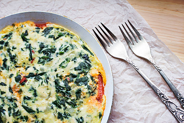 omelet with spinach stock photo