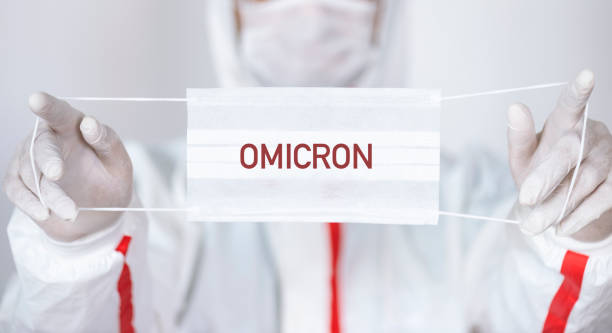 variante omicron - omicron photos et images de collection