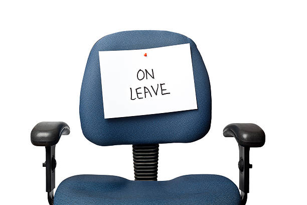 On leave Office chair with a ON LEAVE sign isolated on white background absence stock pictures, royalty-free photos & images