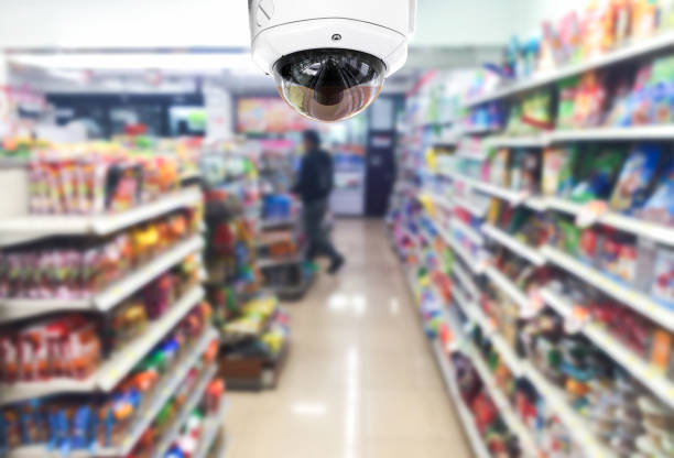 CCTV on shop supermarket on blurry background. stock photo