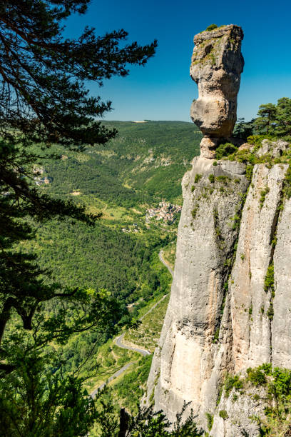 On the Pilgrimage way to Saint Guilhem le Desert This rock in balance, called the Vase de Sèvre, overlooks the valley of the river Jonte gorges du tarn stock pictures, royalty-free photos & images