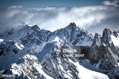 istock on the top of the swiss alps mountain range 1159636118