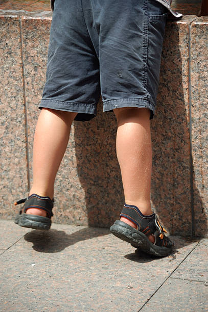 Boys Wearing Sandals Pictures, Images and Stock Photos - iStock