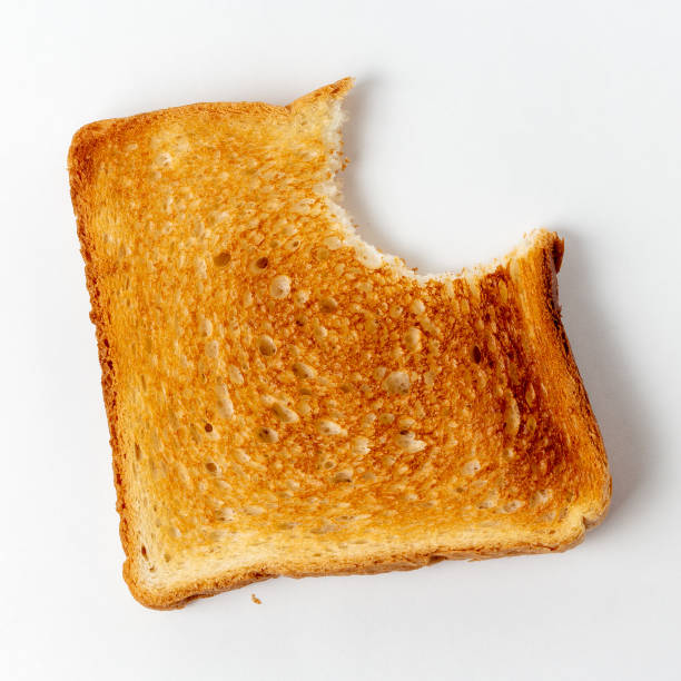 One bitten bread toast stock photo