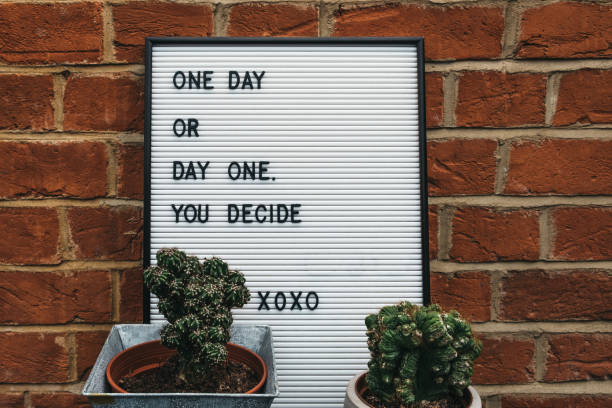 One day or day one motivational quote. stock photo