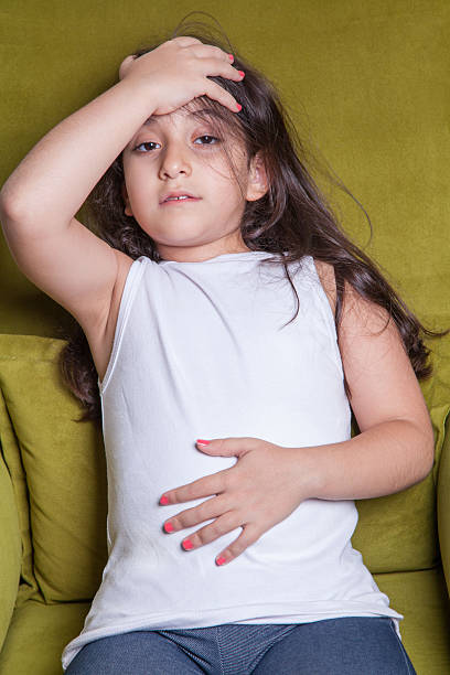 One little middle eastern beautiful small girl sitting feeling bad. One little middle eastern beautiful small girl sitting feeling bad. hot middle eastern girls stock pictures, royalty-free photos & images