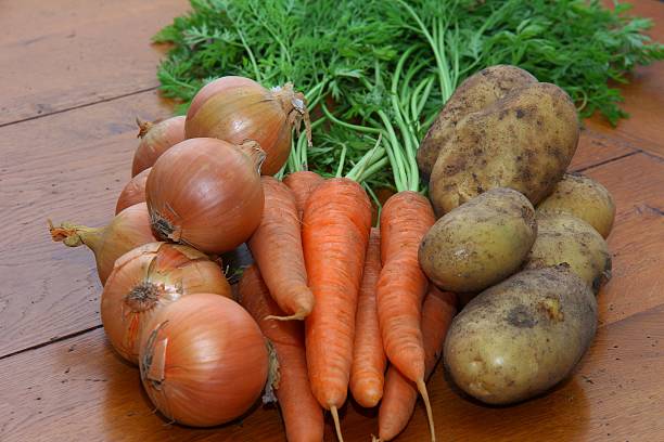 Onions, Carrots and Potatoes stock photo