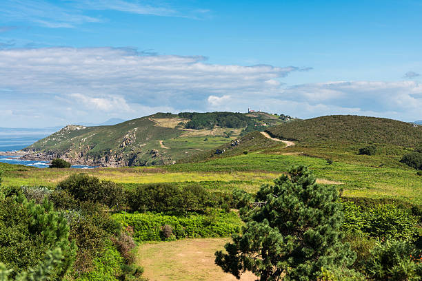 Ons Island in Galicia, Spain Panorama view of Ons island in the Ría de Pontevedra in Galicia, Spain. This island was designated a Special Protection Area for bird-life in 2001 by the European Union, and a year later it became part of the Atlantic Islands of Galicia National Park. atlantic islands stock pictures, royalty-free photos & images