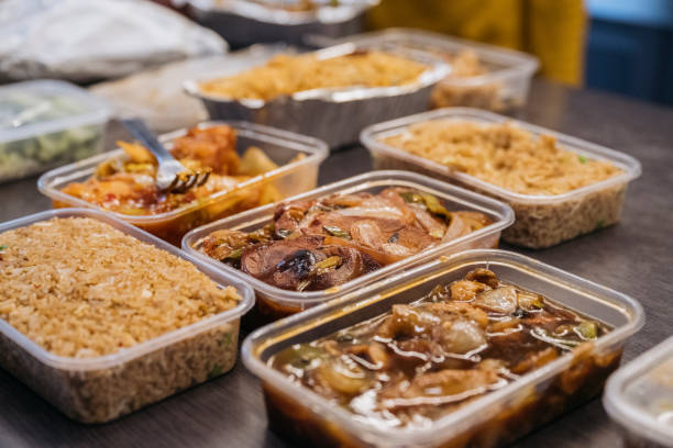 Open containers of Chinese take away food ready for serving stock photo