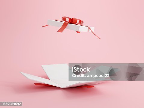 istock Open gift box with red ribbon over pink background. Happy birthday, Merry Christmas, New Year, Wedding or Valentine Day concept. 3D rendering illustrations. 1339064042