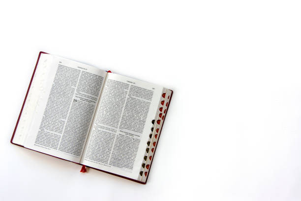 Open holy bible in bahasa Indonesia on white background Open holy bible in bahasa Indonesia on white background indonesia photos stock pictures, royalty-free photos & images
