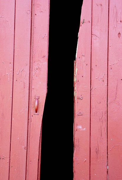 open red barn doors stock photo