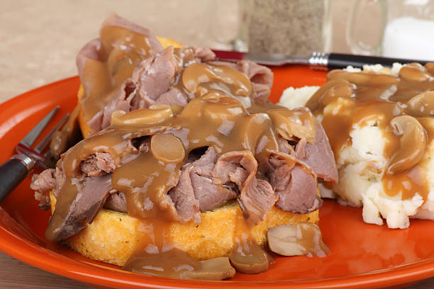 Open Roast Beef Sandwich Open roast beef sandwich with mash potatoes and mushroom gravy roast beef sandwich stock pictures, royalty-free photos & images