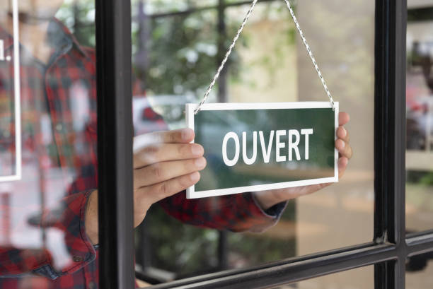 Open sign in French language stock photo