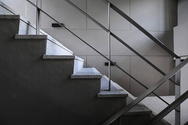 Open stairwell in a modern building Open stairwell in a modern building  . evacuation stock pictures, royalty-free photos & images