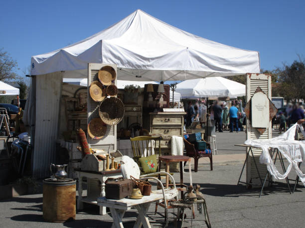 Open Vintage Market,Ca California is a state filled with fantastic hidden treasures with a rich artistic heritage. California flea market scene is one of the richest and most dynamic in the US.At these markets you may find collectibles and clothing, to fruit, vegetables, toys, books, cars, car stereo equipment, toiletries, artwork, tools, cookware, pottery,carved woods and cosmetics, among other things flea market photos stock pictures, royalty-free photos & images