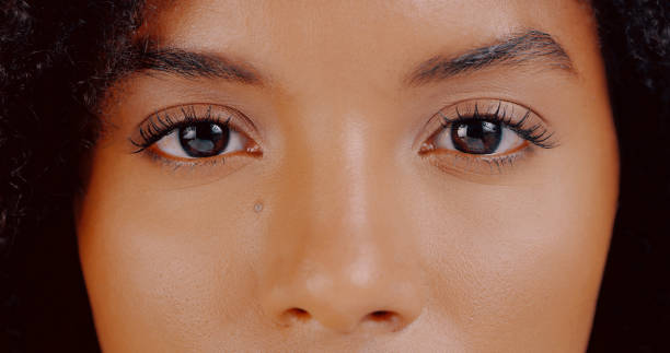Open your eyes, what do you see? Cropped studio shot of a beautiful young woman’s eyes brown eyes stock pictures, royalty-free photos & images