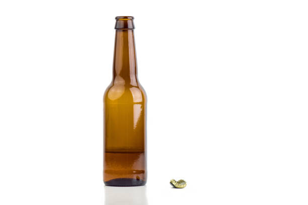 opened beer bottle - empty beer bottle imagens e fotografias de stock