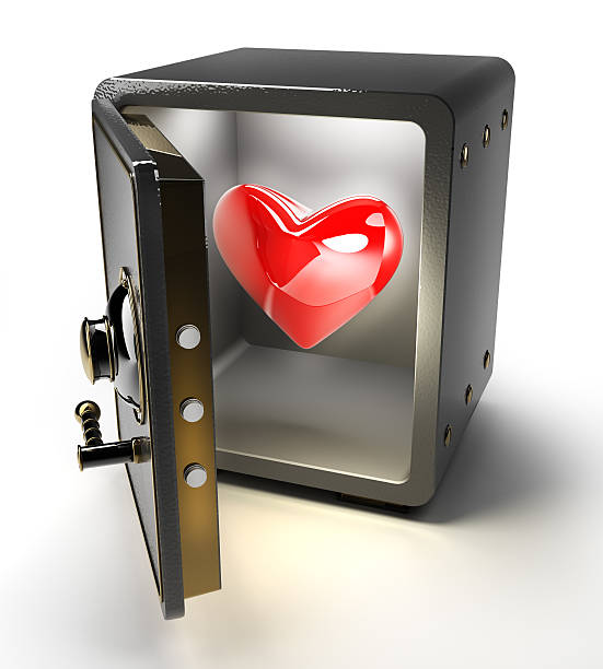 Opened safe with red heart stock photo
